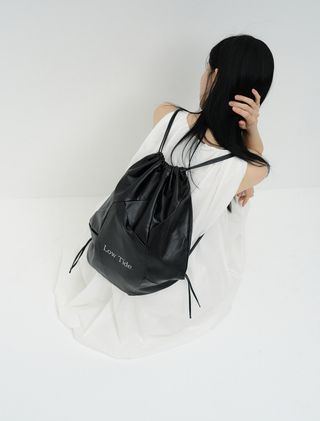 [1st REORDER] STRING BACKPACK [BLACK] - Low Tide