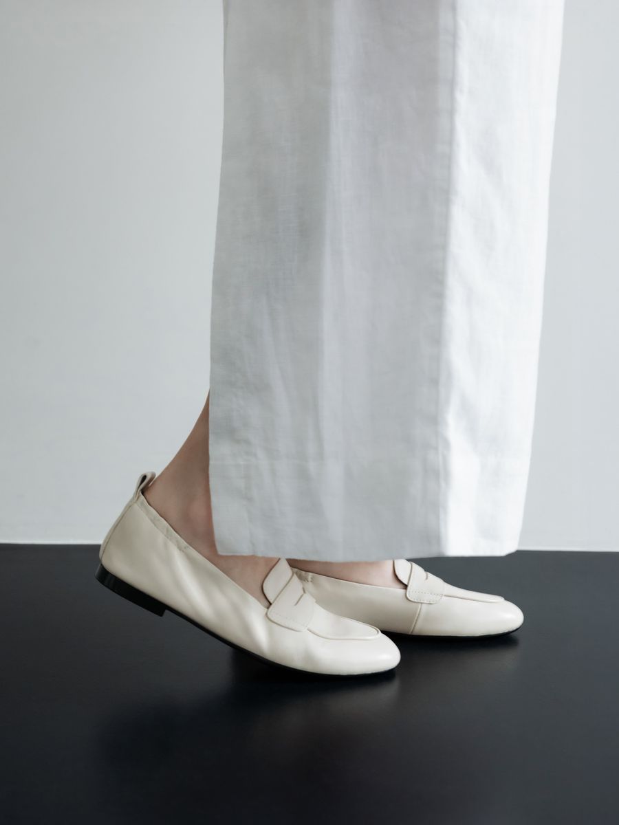 Ivory flat loafers